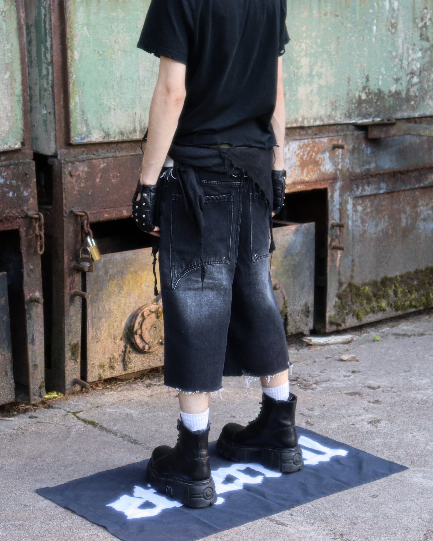 Binary distressed denim shorts